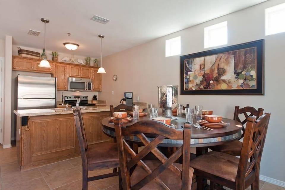 Our dining area seats 5 and is nestled behind the living area and in front of the kitchen.