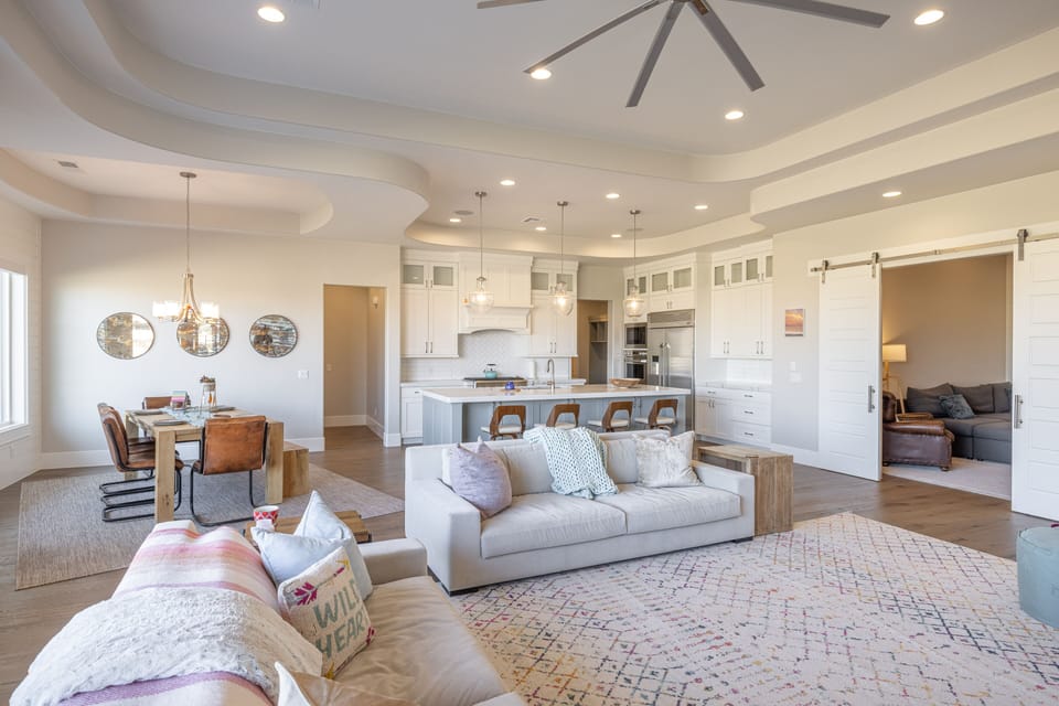 Living Room View - The Living Room is located adjacent to the dining room and is the perfect place to relax and watch your favorite movie or TV program.