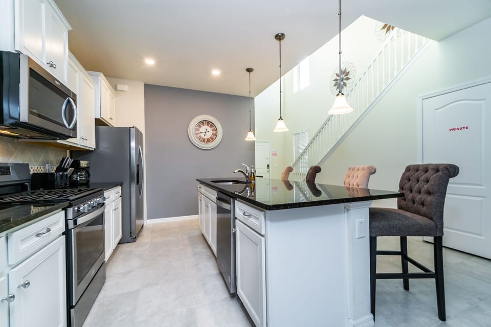 Kitchen showing stairs