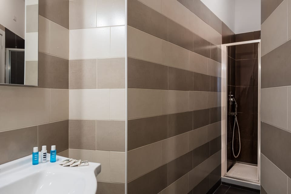 City Apartment | Bathroom | Shower, rainfall showerhead, hair dryer, bidet