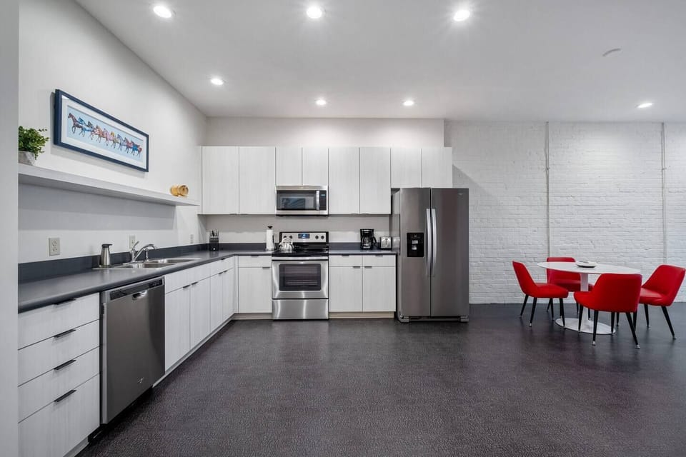 Another view of the kitchen and dining area