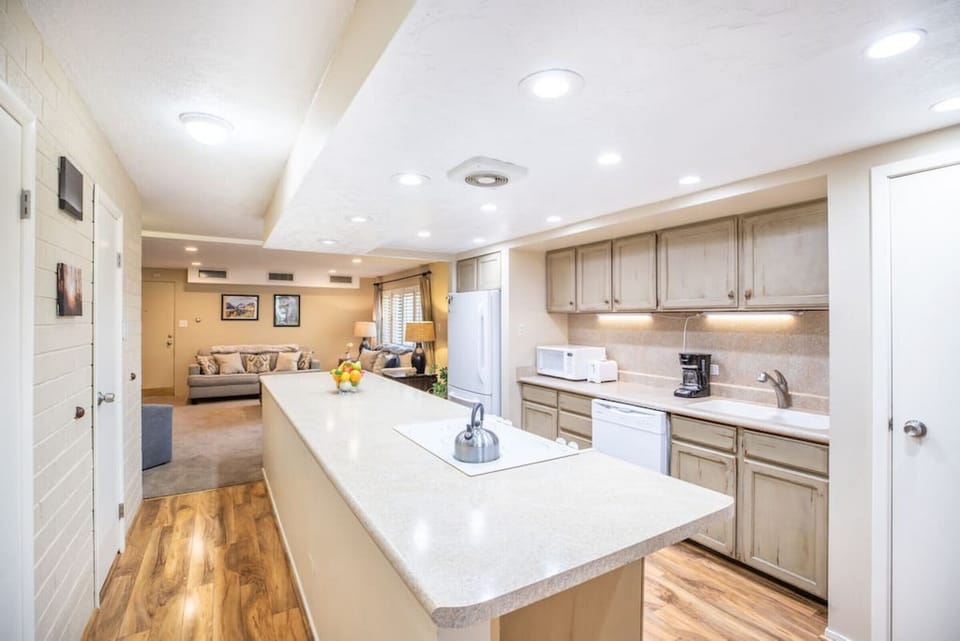 Modern kitchen with expansive countertops for all your culinary adventures.