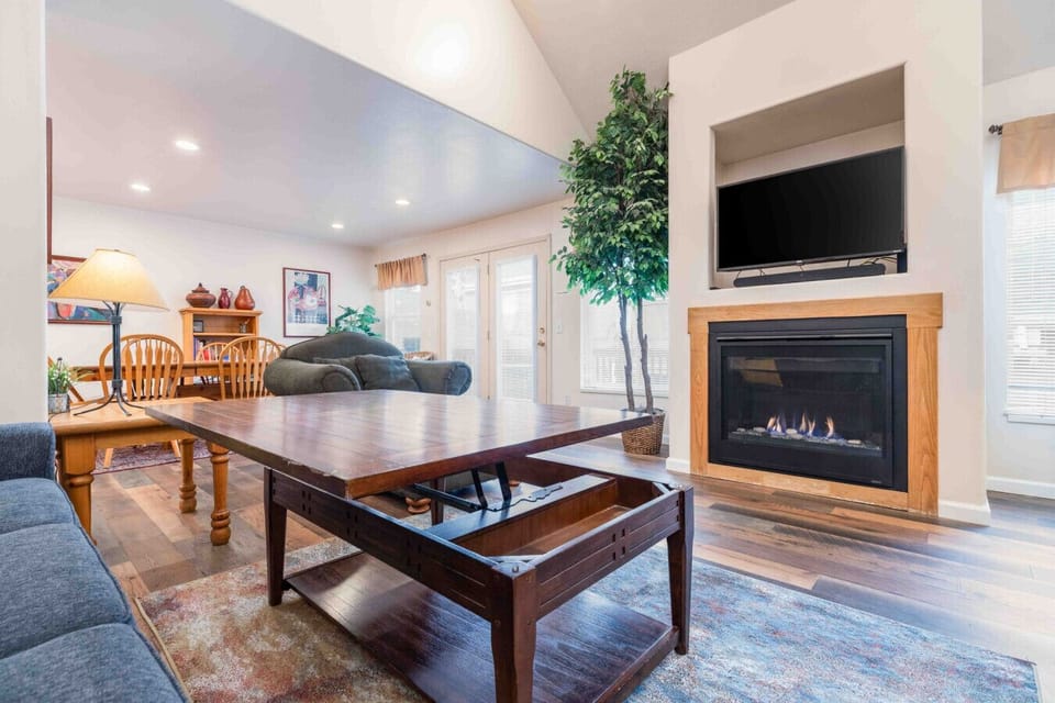 Modern living area with a fireplace for cozy vibes.
