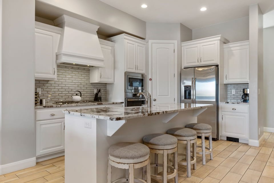 Townhome, 4 Bedrooms | Private kitchen | Coffee/tea maker, fridge, oven, toaster