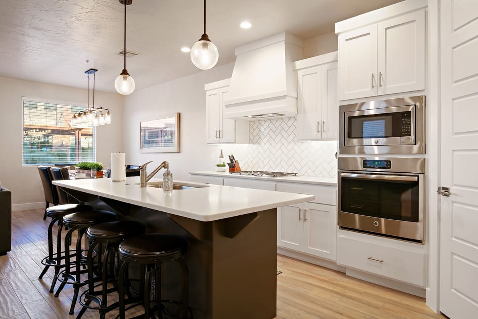 Townhome, 4 Bedrooms | Private kitchen | Fridge, oven, coffee/tea maker, toaster