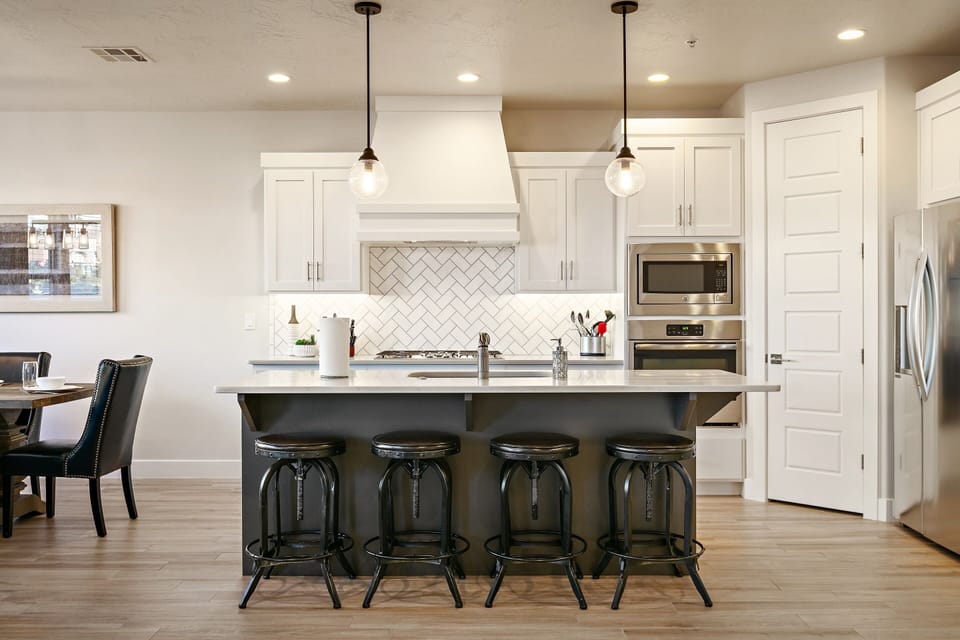 Townhome, 4 Bedrooms | Private kitchen | Fridge, oven, coffee/tea maker, toaster