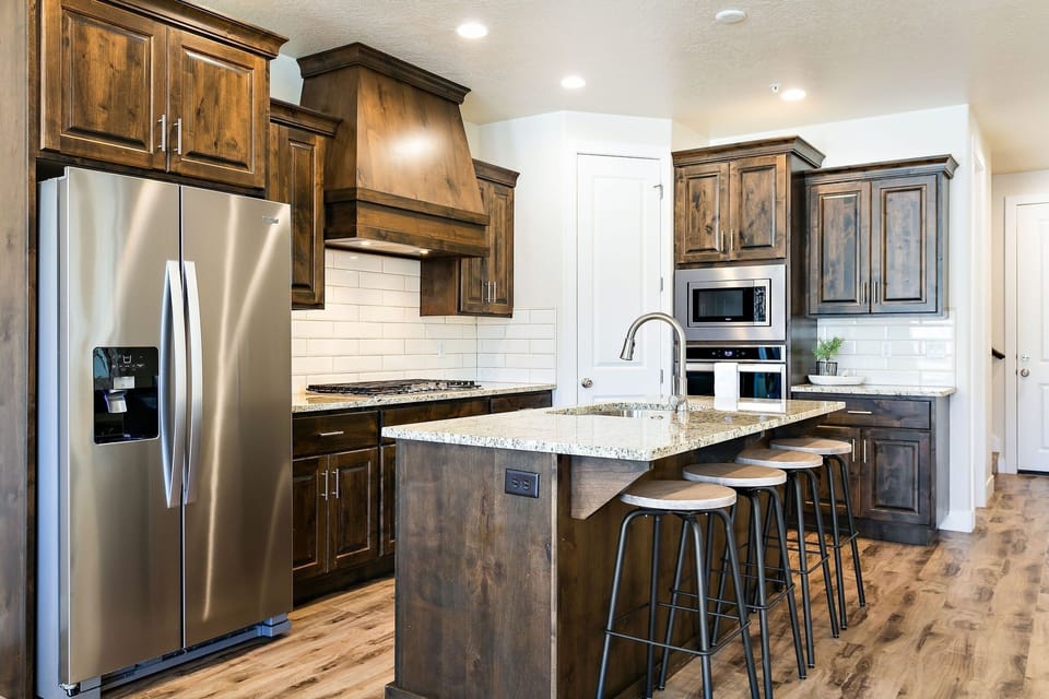 Townhome, 5 Bedrooms | Private kitchen | Fridge, oven, coffee/tea maker, toaster