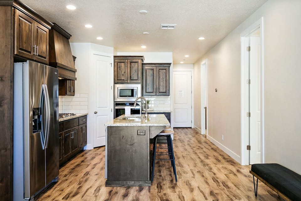 Townhome, 5 Bedrooms | Private kitchen | Fridge, oven, coffee/tea maker, toaster