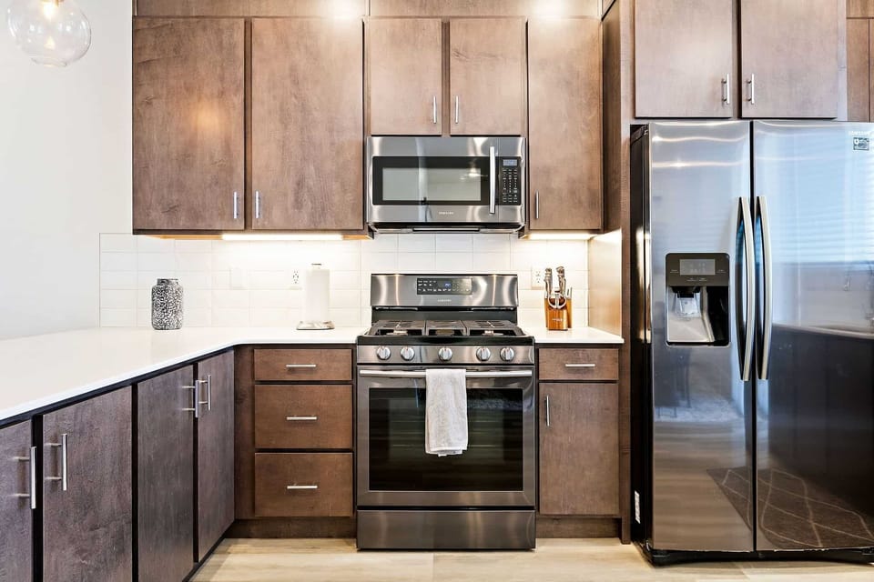 Townhome, 4 Bedrooms | Private kitchen | Coffee/tea maker, fridge, oven, toaster