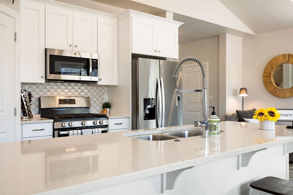 Townhome, 3 Bedrooms | Private kitchen | Fridge, oven, coffee/tea maker, toaster