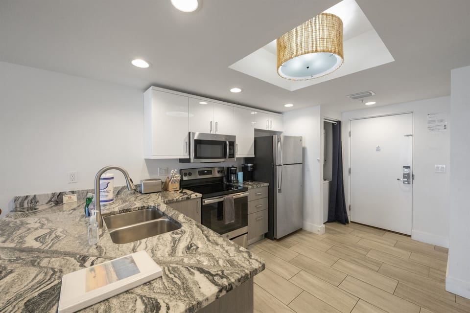 Kitchen, fully stocked with cooking/eating utensils