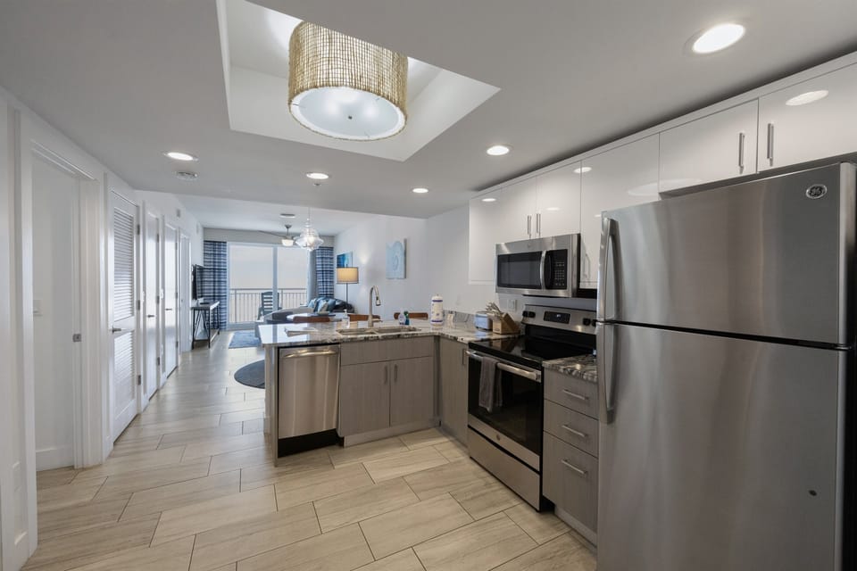 Kitchen, fully stocked with cooking/eating utensils