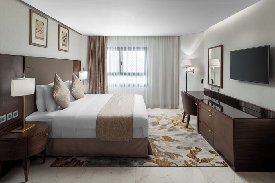 Premier Suite, 2 Bedrooms (City, 1 King & 2 Double) | Hypo-allergenic bedding available, minibar, in-room safe, desk