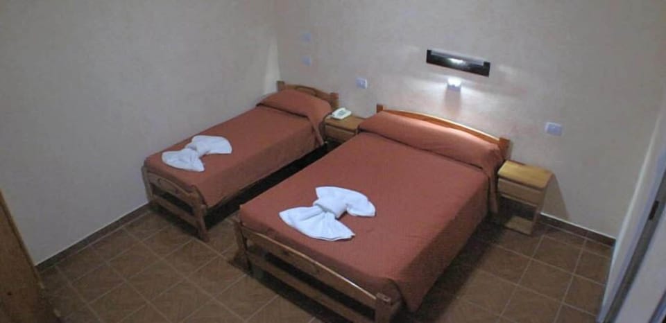 Triple Room | Pillowtop beds, free WiFi, bed sheets