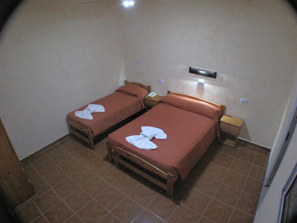 Triple Room | Pillowtop beds, free WiFi, bed sheets