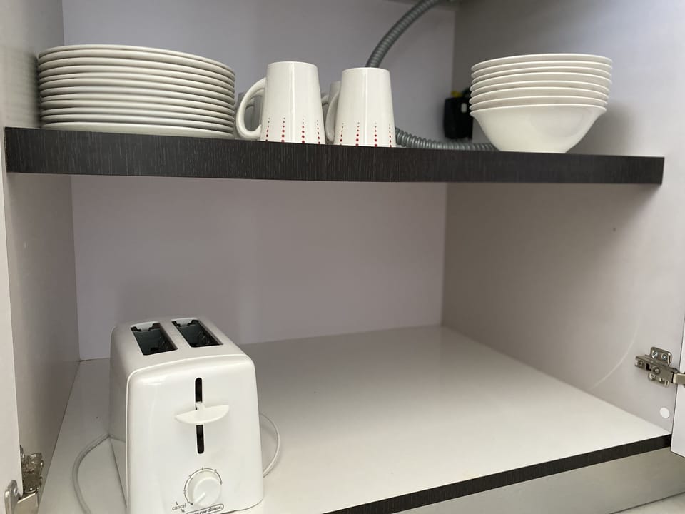 Family Apartment, 2 Bedrooms, Kitchen, Oceanfront | Private kitchen | Full-size fridge, microwave, stovetop, coffee/tea maker
