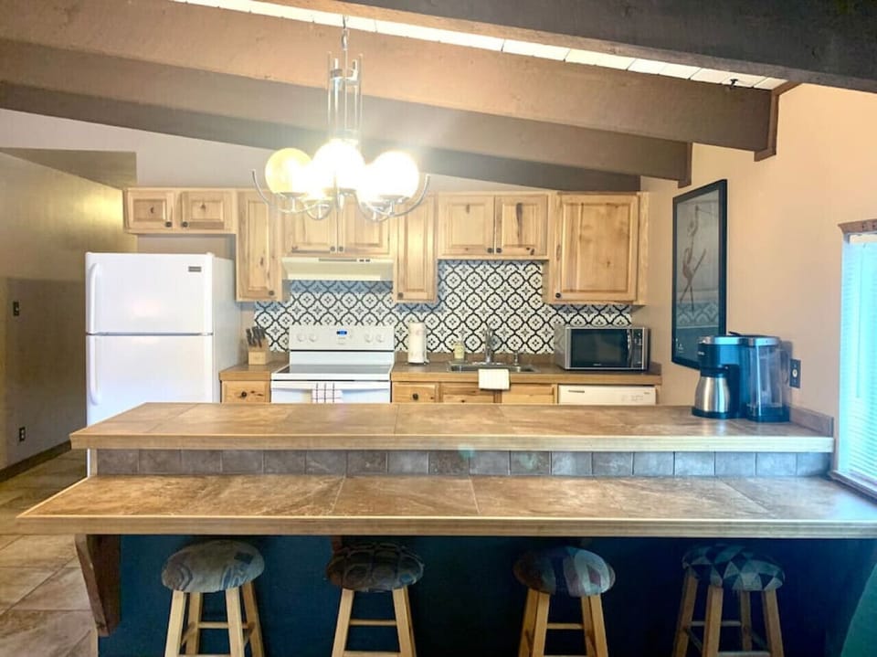 Fully stocked kitchen--from chip-clips to a blender, crockpot, more.