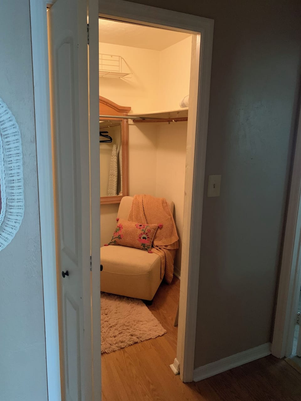 Large walk in closet/ dressing room in the master bedroom .