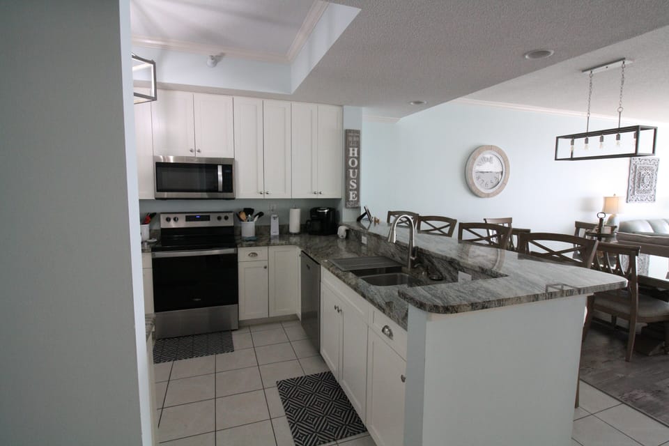 Granite counters & stainless steel appliances.