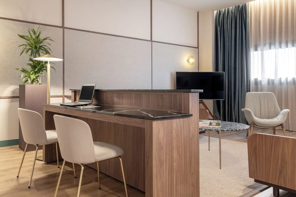 Down comforters, pillowtop beds, minibar, in-room safe