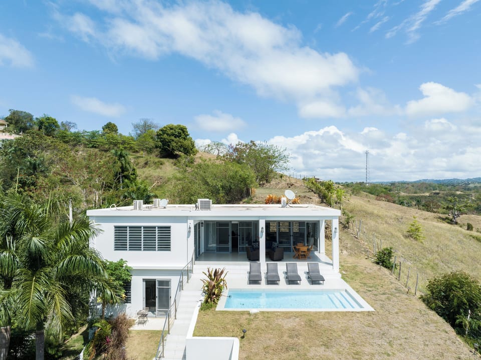 Aerial view of Villa, surrounded by 200 acre horse ranch. 10 minute walk beach