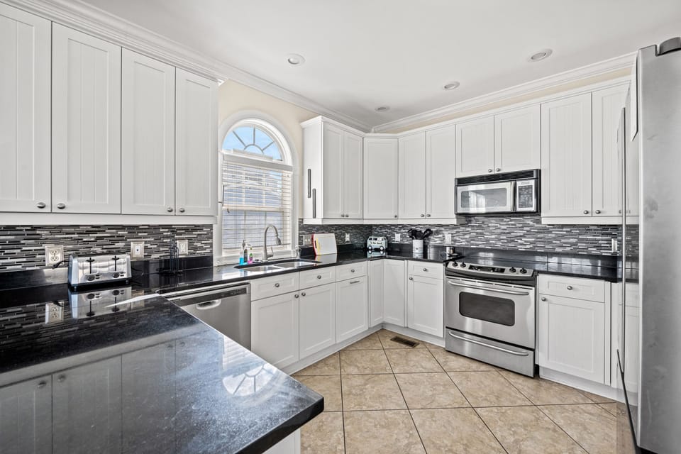 The family chef will enjoy this modern kitchen with lots of counter space.