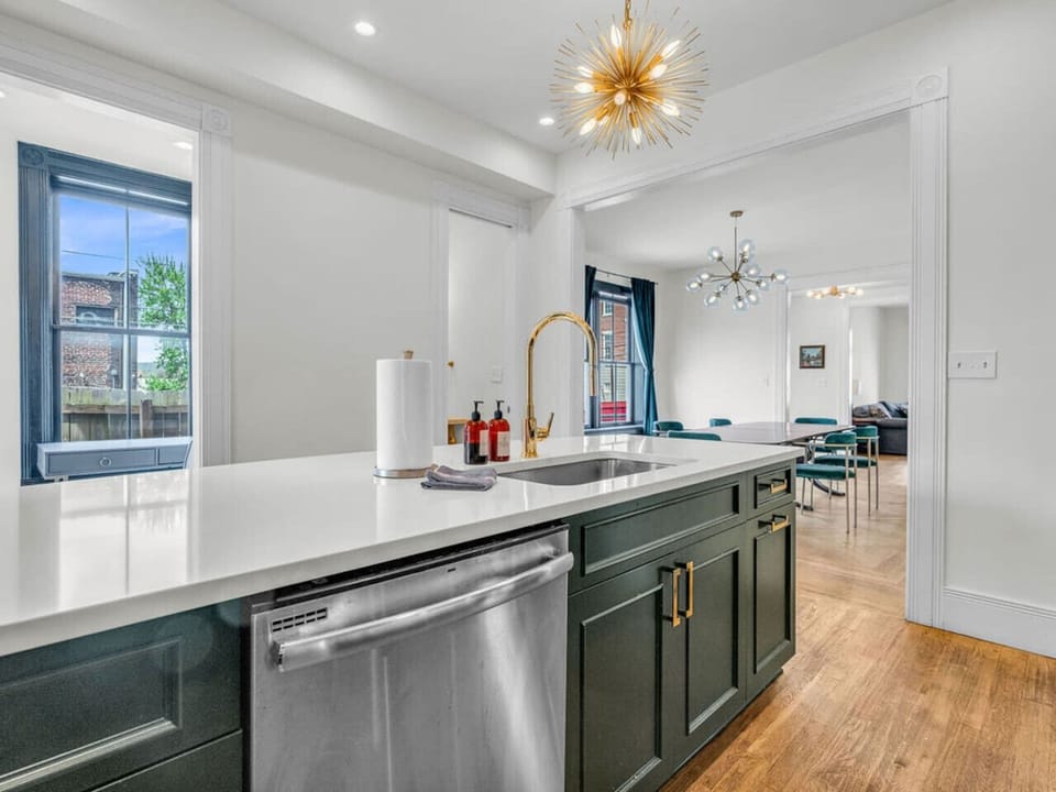 Kitchen: Bright and stylish with modern fixtures and vibrant finishes, perfect for culinary adventures!