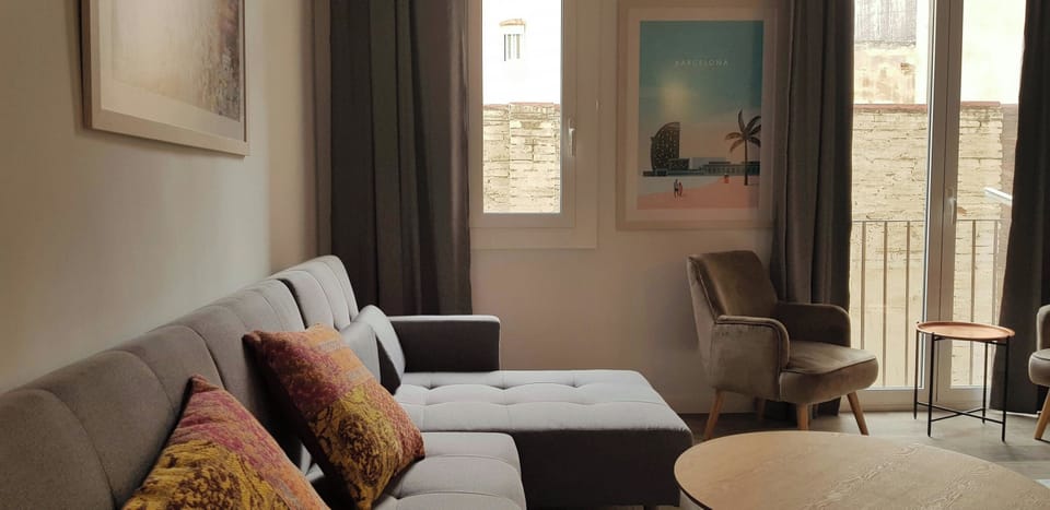Natural light floods the space. The apartment faces the building’s inner side.