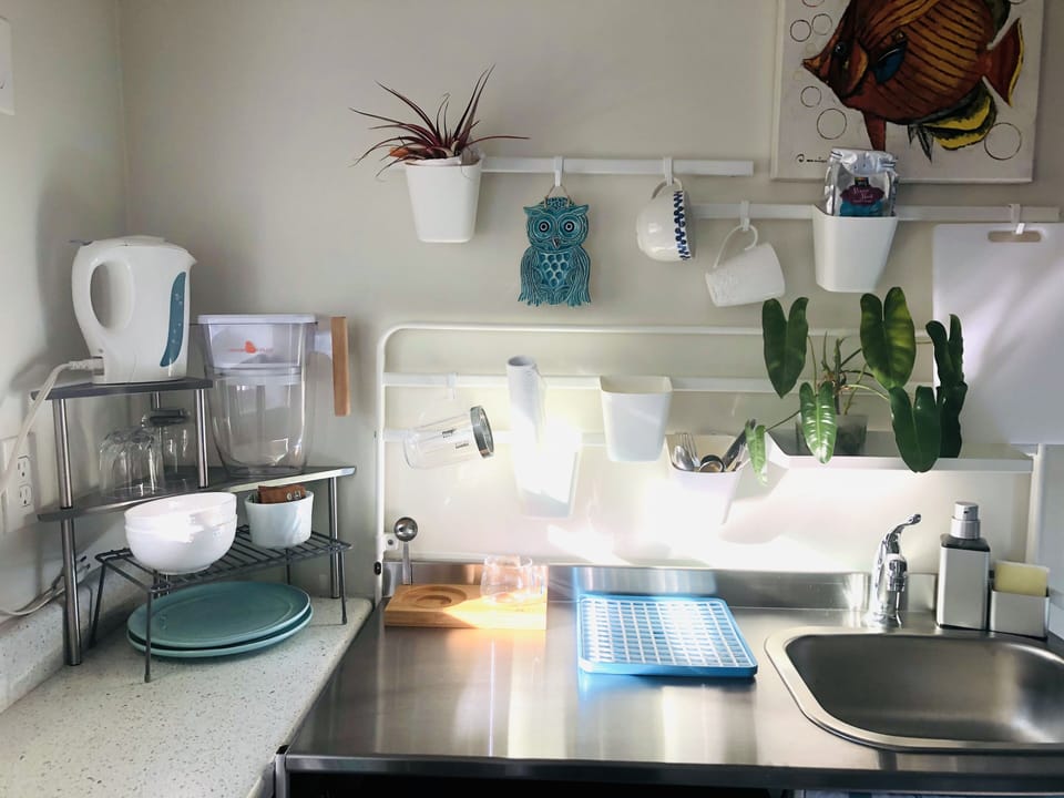 Kitchenette, water filter, coffee, toaste oven, microwave, mini fridge/freezer