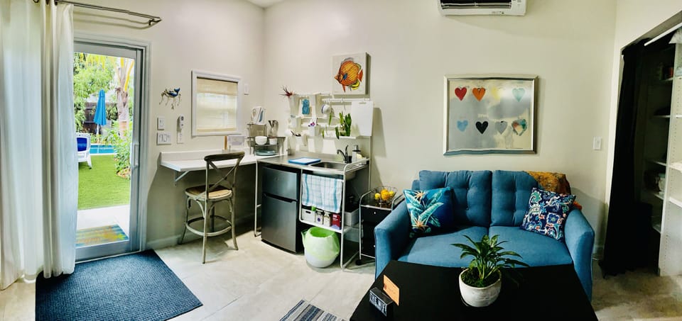 Your space, Kitchenette, loveseat, coffee table.  Closet with essentials.  
