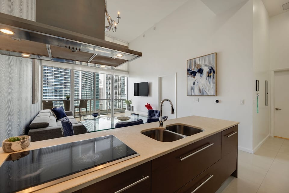 Cook with a view in this sleek, fully stocked kitchen.