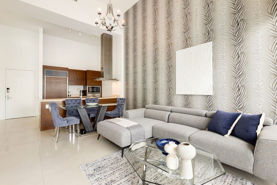 Elegant open concept design with modern furnishings.