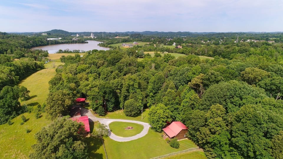 Aerial of the property.  16 acres of woods, pasture, off-leash dog area.  