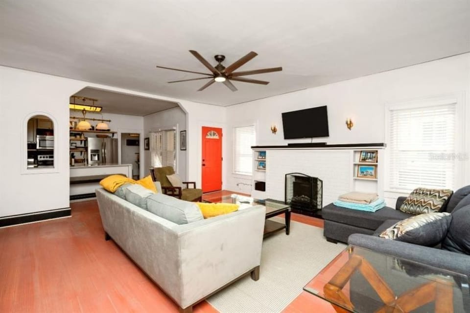 living room with two sleeper sofas and 42" Smart tv.