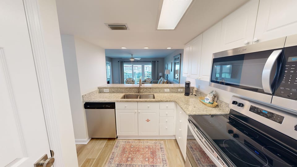 Condo, 2 Bedrooms | Private kitchen | Fridge, microwave, coffee/tea maker, toaster