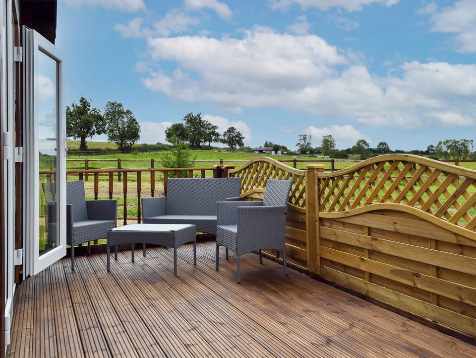 Sitting-out-area | Pheasant Lodge - Coplow Cabins, Billesdon, near Leicester