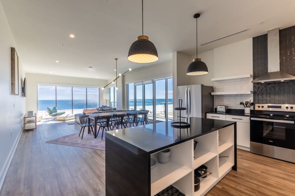 Spacious kitchen equipped with modern appliances and cooking basics to make you favorite meals!