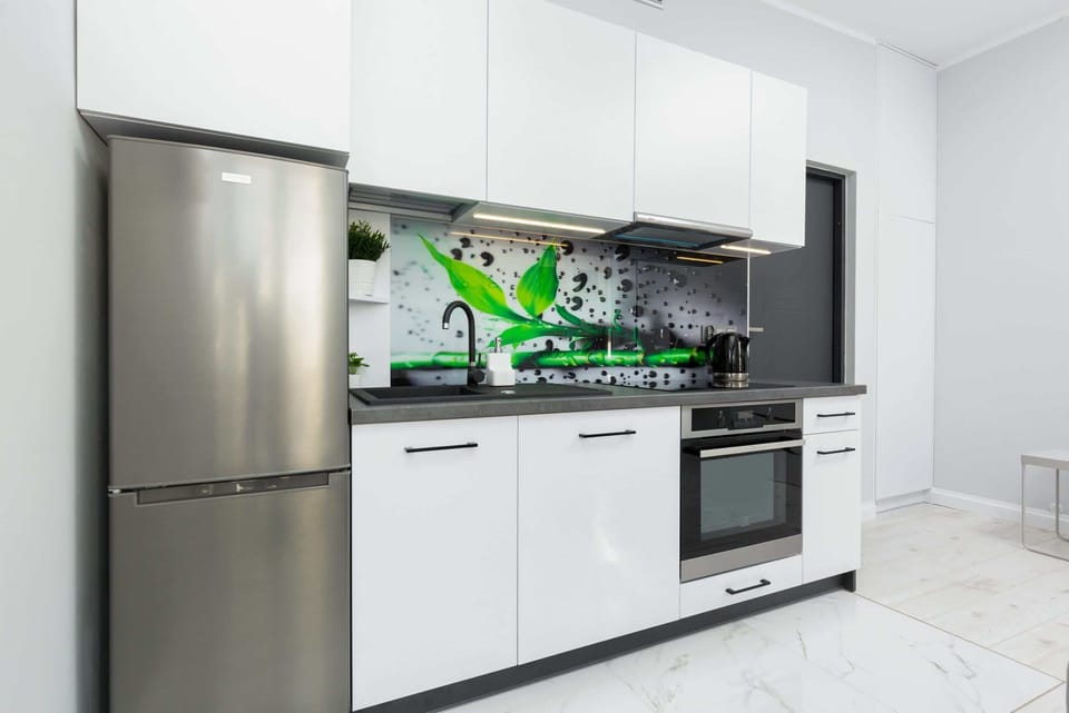The fully equipped kitchenette includes everything you need for a home-cooked meal.
