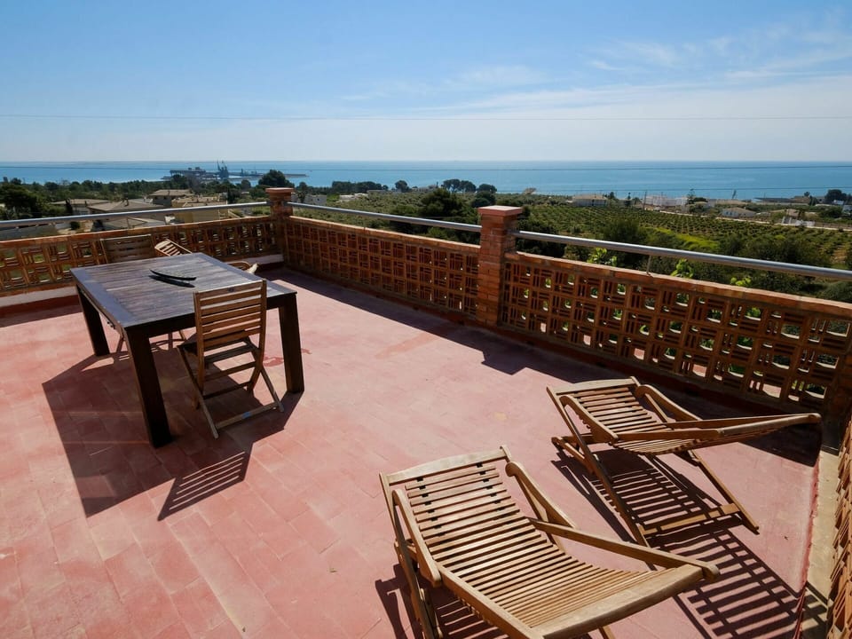 Sky, Property, Furniture, Water, Wood, Cloud, Shade, Outdoor Furniture, Architecture, Interior Design