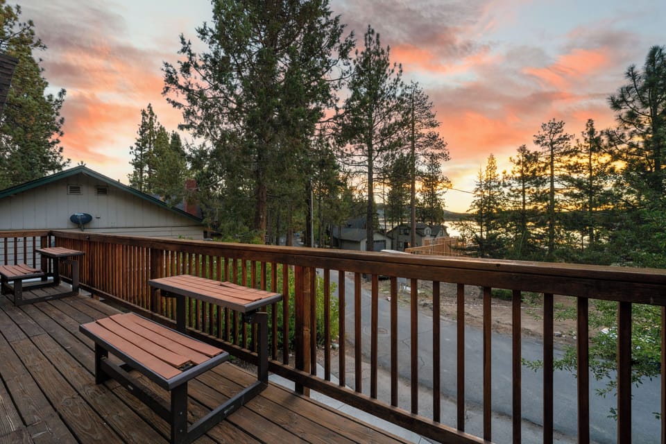 Upper Deck - Outdoor deck with seating and peekaboo lake view. Steps to the lake