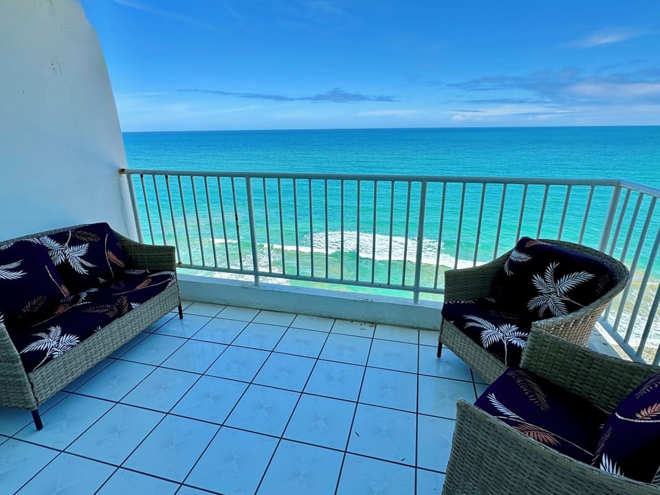 The balcony is a perfect spot to catch the sun rise or watch surfing 🏄 and chill