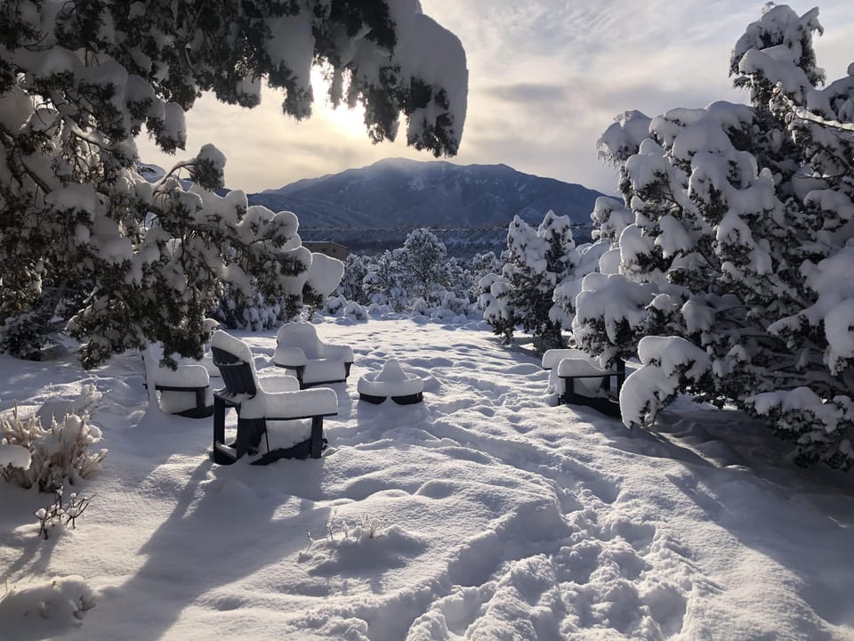 Snowy sunrise over the fire pit