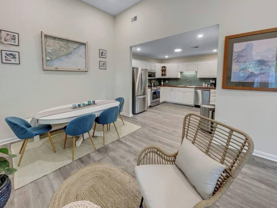 Dining room opening up to kitchen.