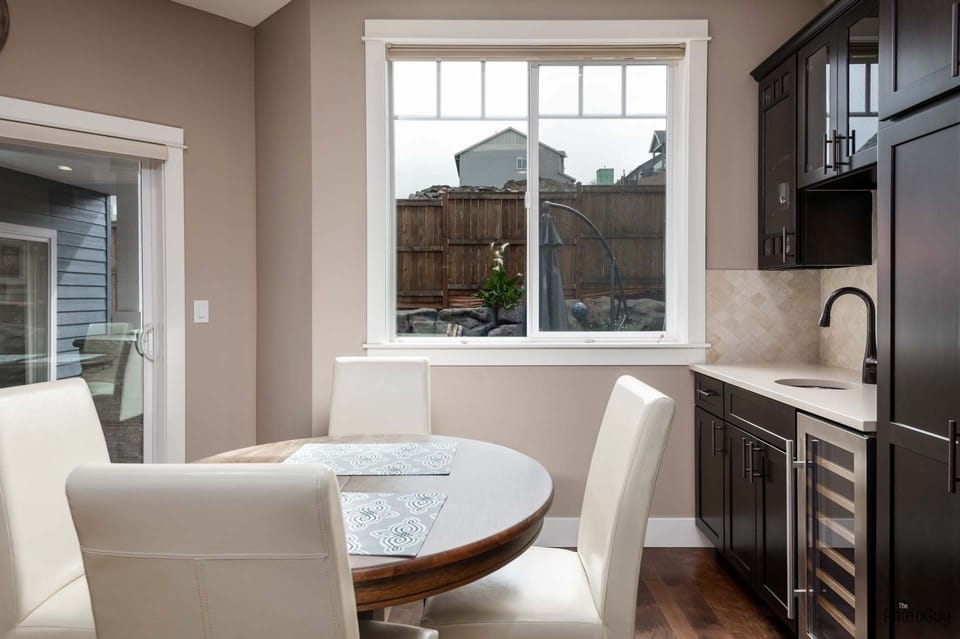 Dining area, table opens with stored leaf in middle of table accommodate 6-8