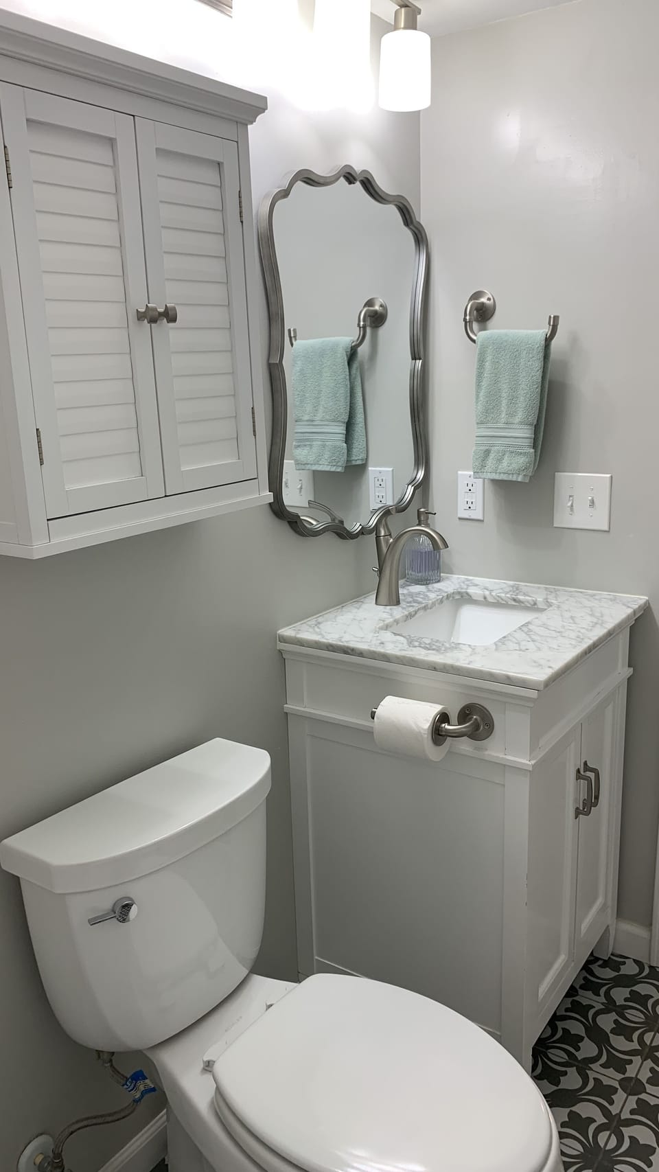 2nd bathroom. Wood/marble vanity. Plenty of room for your stuff!