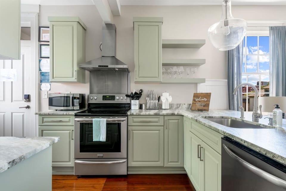 Modern kitchen with stainless steel appliances for all your cooking needs.