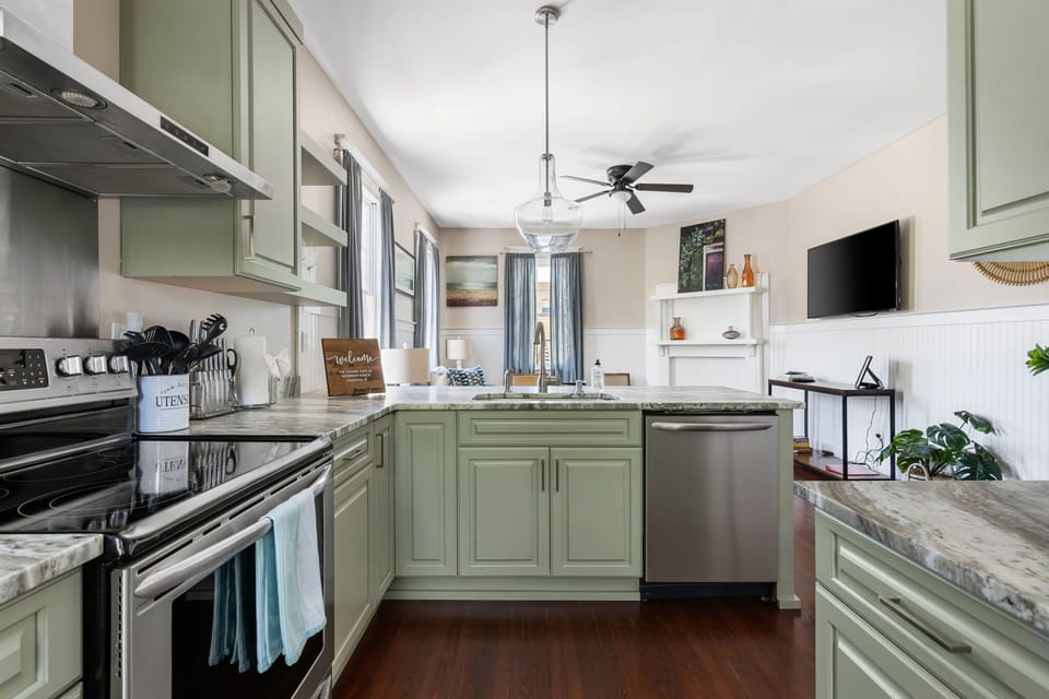 Modern kitchen with stainless steel appliances for all your cooking needs.