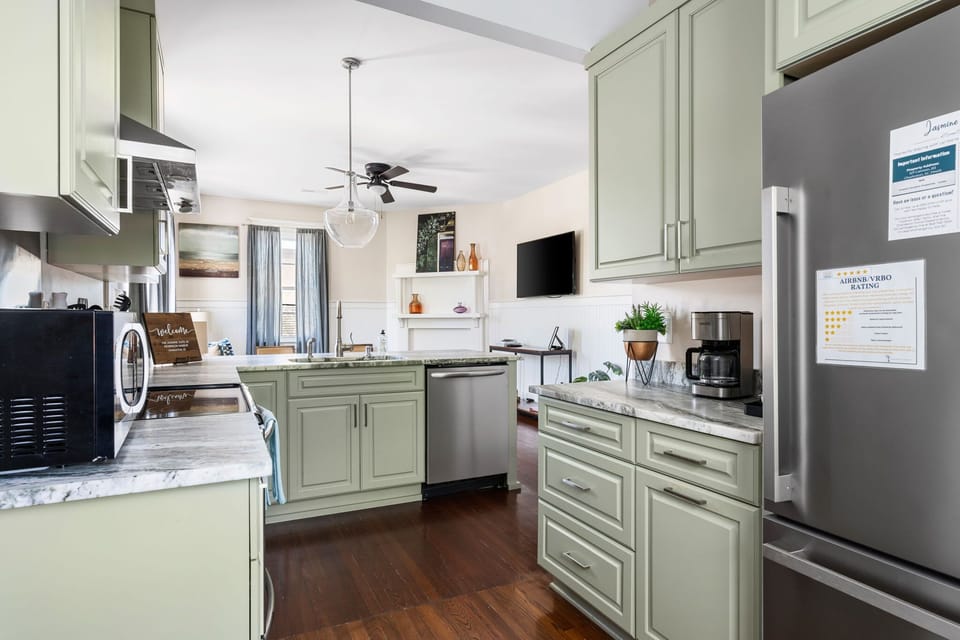 Modern kitchen with stainless steel appliances for all your cooking needs.