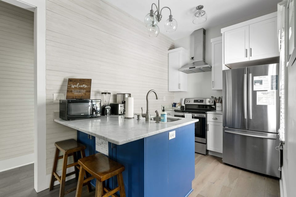 Chic breakfast bar with comfy stools – ideal for a morning coffee or evening wine.