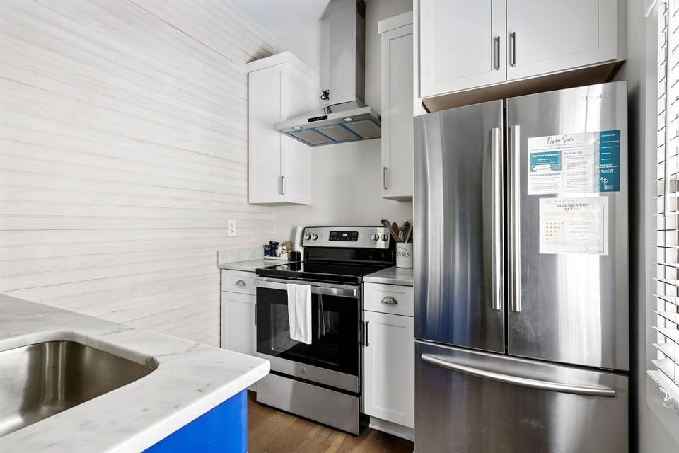 Enjoy home-cooked meals in a fully equipped kitchen with modern appliances.